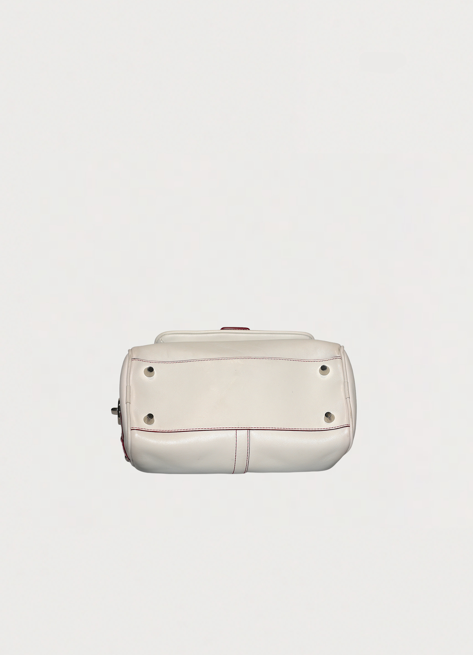 Vintage Coach embroidered heart satchel in leather with suede trim showing base