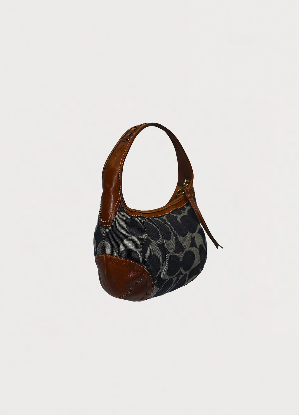 Vintage Coach Ergo monogram hobo in blue signature canvas with leather trim showing angled side