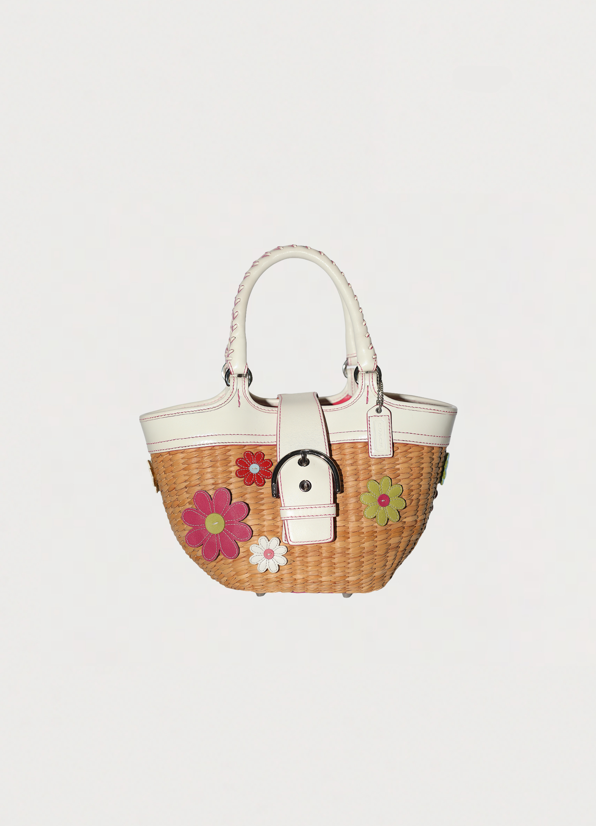 Vintage Coach Flowered straw handbag in white leather trim showing front side