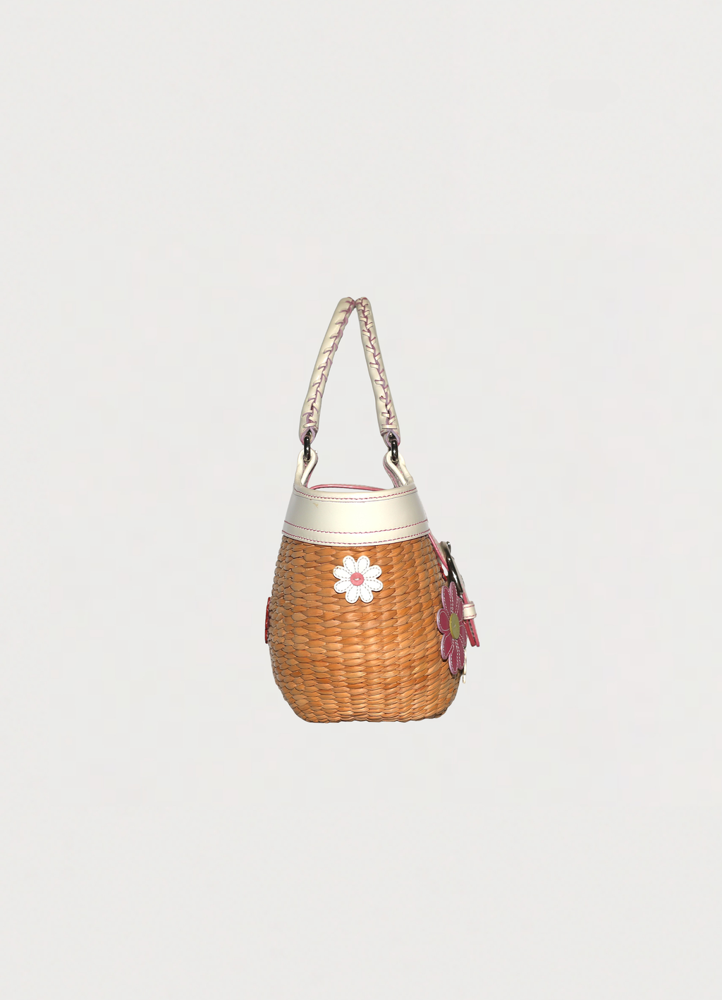 Vintage Coach Flowered straw handbag in white leather trim showing right side