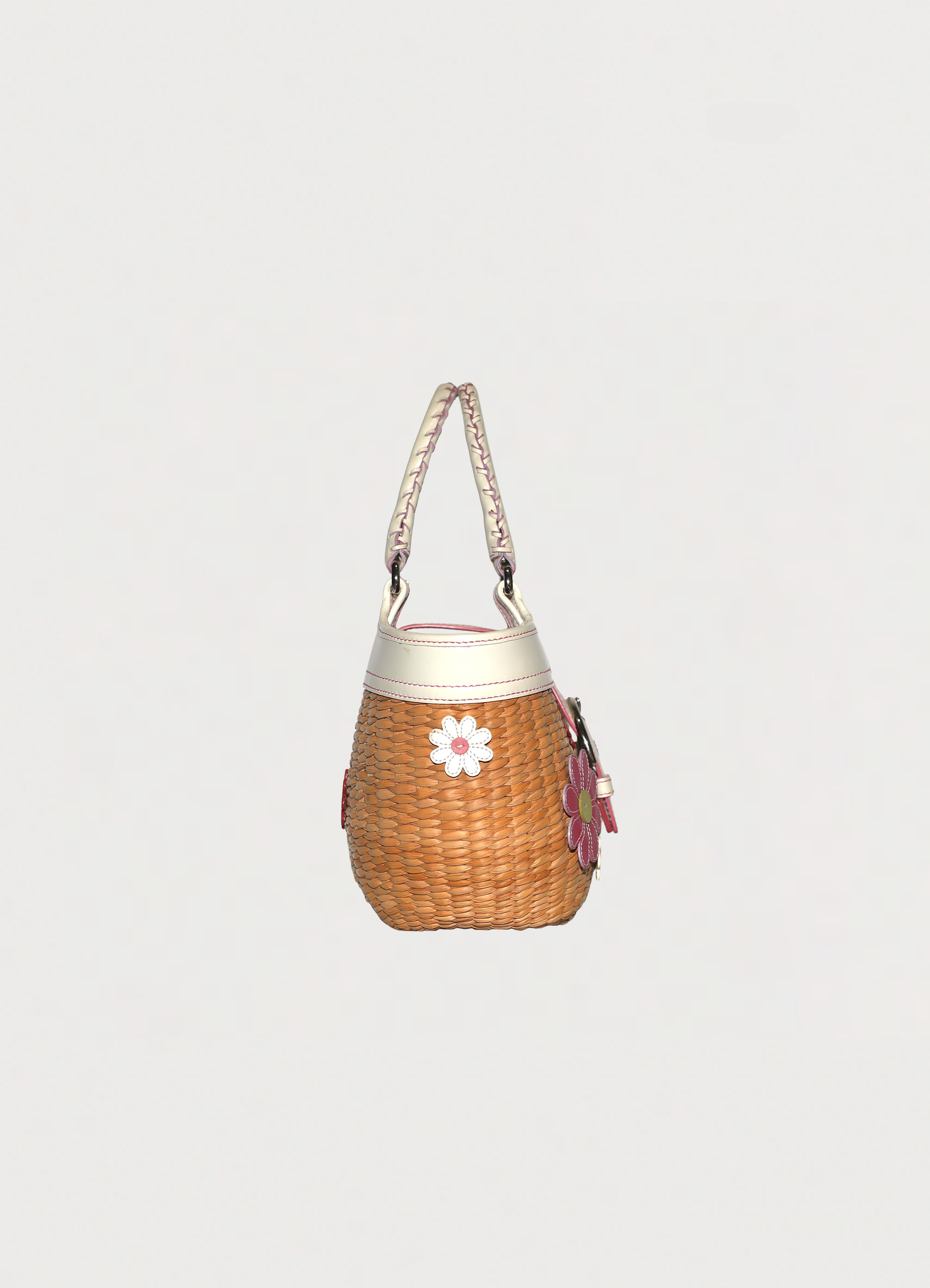 Vintage Coach Flowered straw handbag in white leather trim showing right side