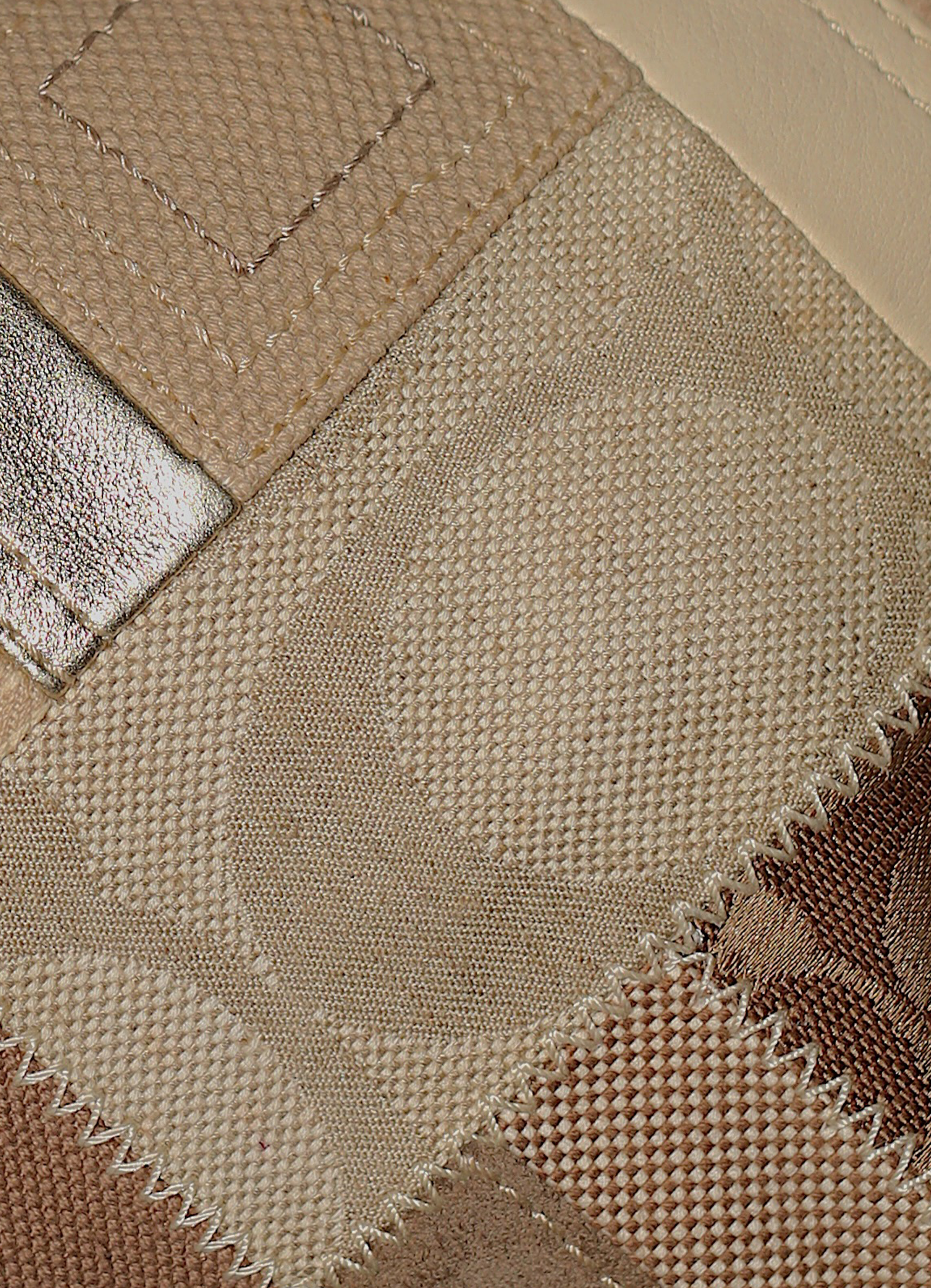 Vintage Coach Hamptons baguette bag in brown signature canvas with leather trim showing close up of print