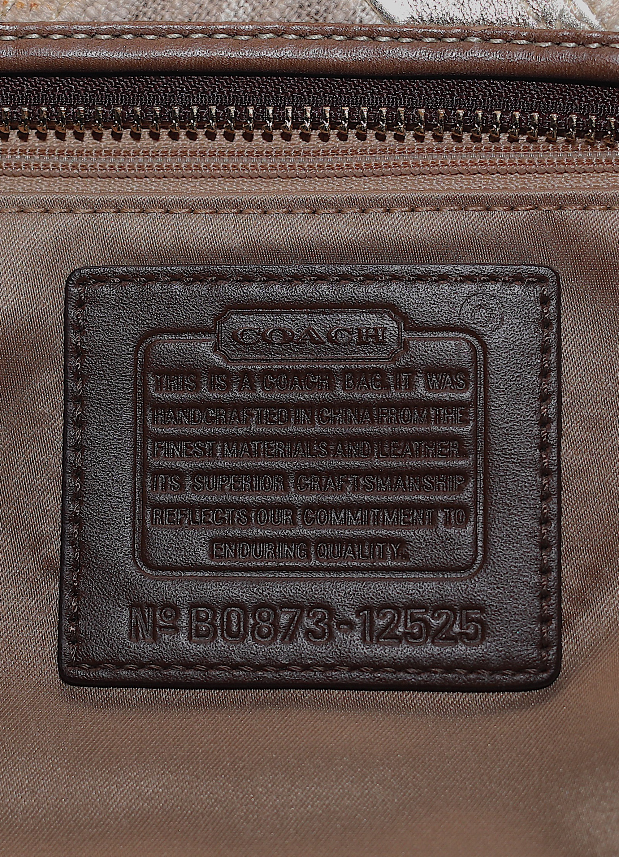 Vintage Coach Hamptons baguette bag in brown signature canvas with leather trim showing creed patch