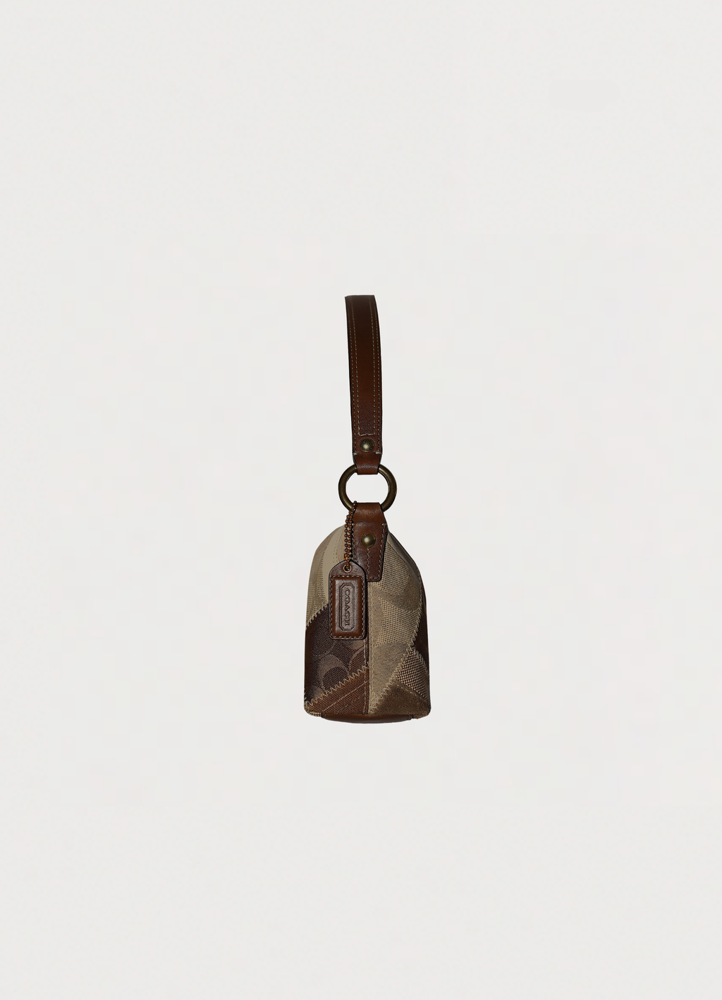 Vintage Coach Hamptons baguette bag in brown signature canvas with leather trim
showing left side