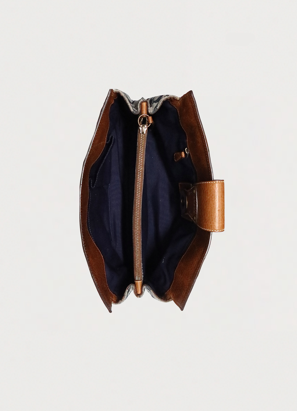 Top view of Coach patchwork bag showing interior compartment and blue lining