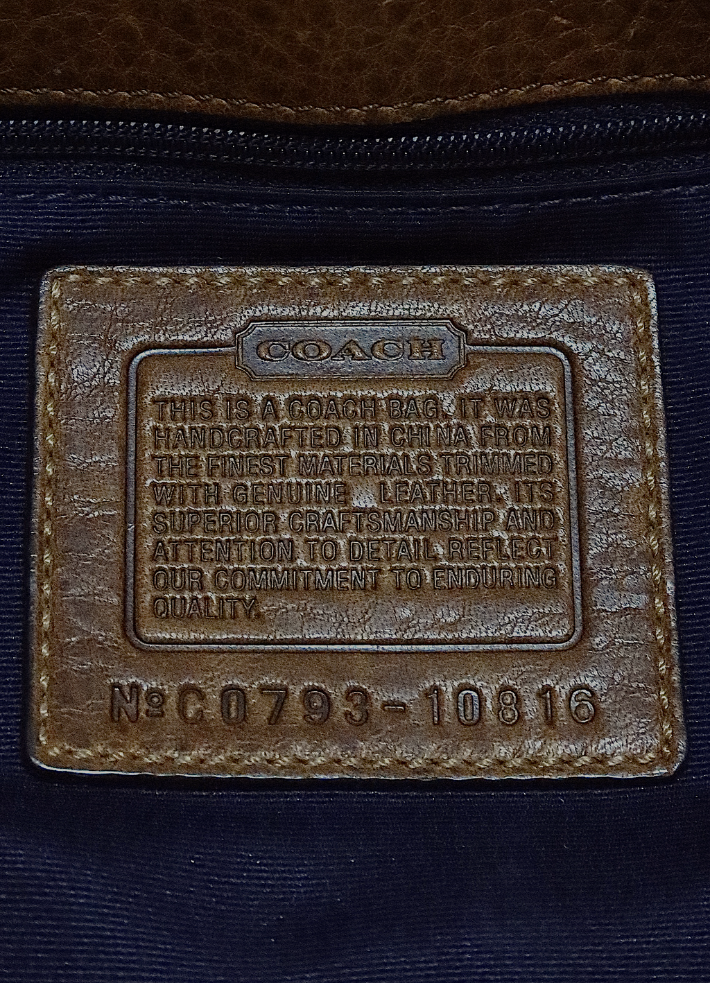 Interior leather Coach creed patch with serial number for authenticity