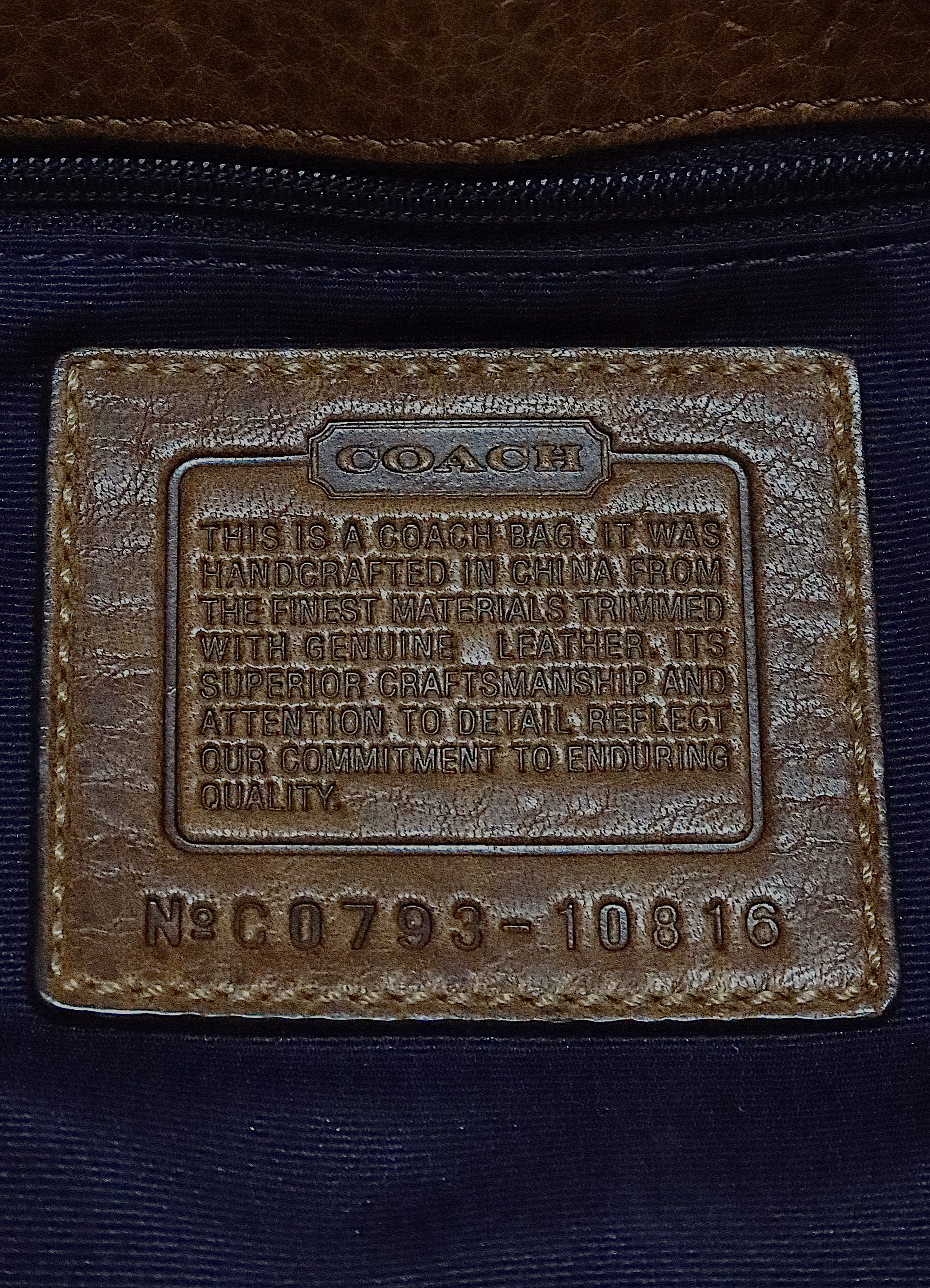 Interior leather Coach creed patch with serial number for authenticity
