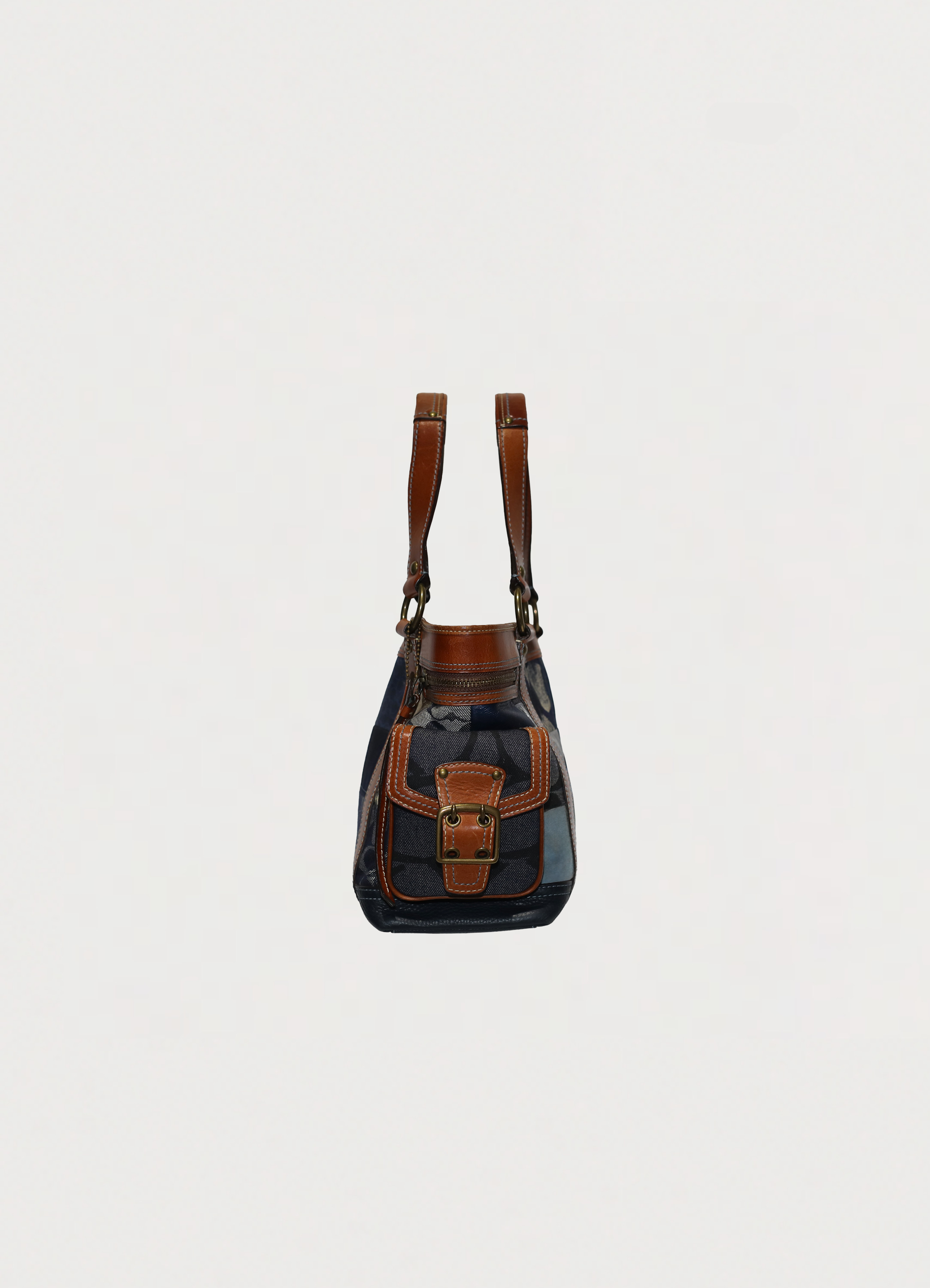Vintage Coach Legacy denim tote bag in blue signature canvas with leather trim showing right side