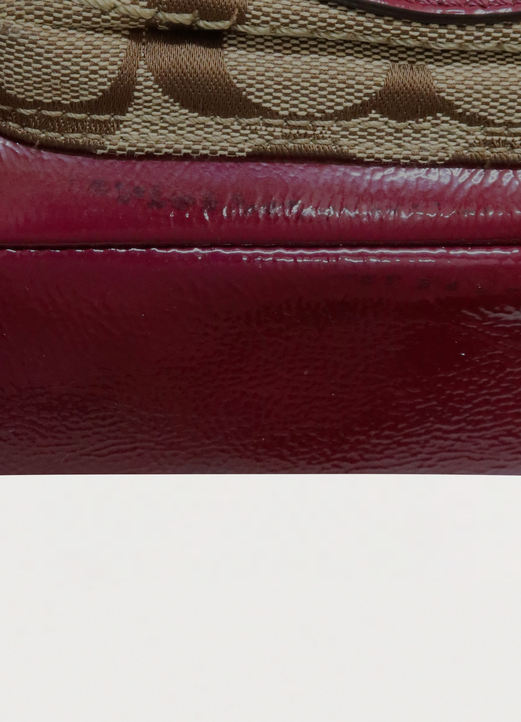 Close up of bottom seam on the Coach Legacy bag