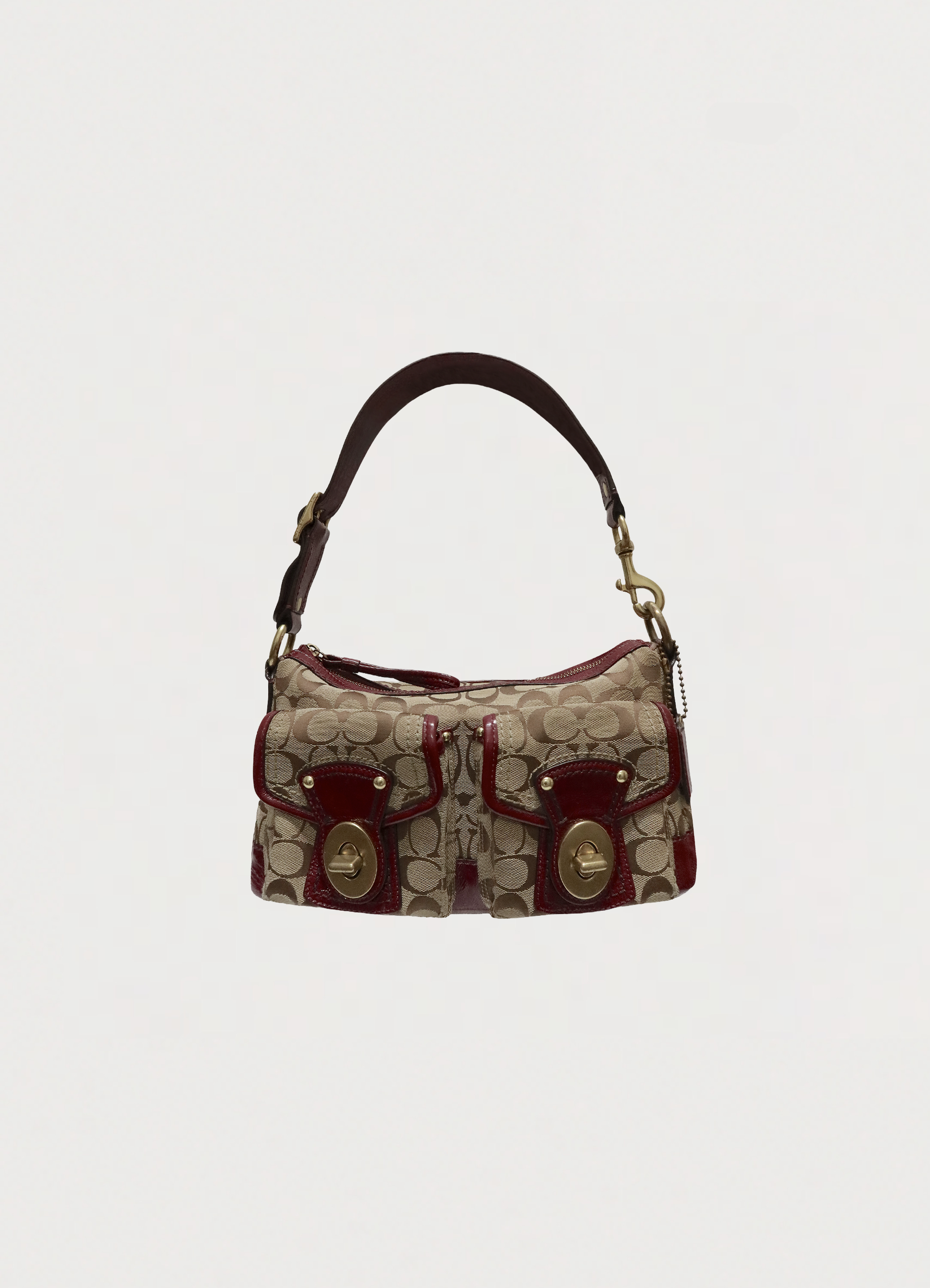 Vintage Coach Legacy turnlock demi pouch in khaki signature canvas and beet red leather front view