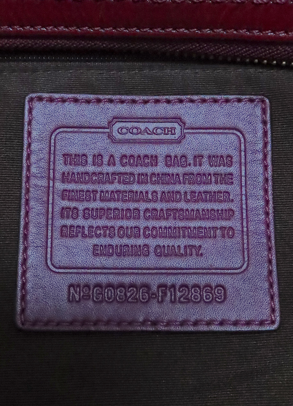 Interior leather Coach creed patch with serial number for authenticity