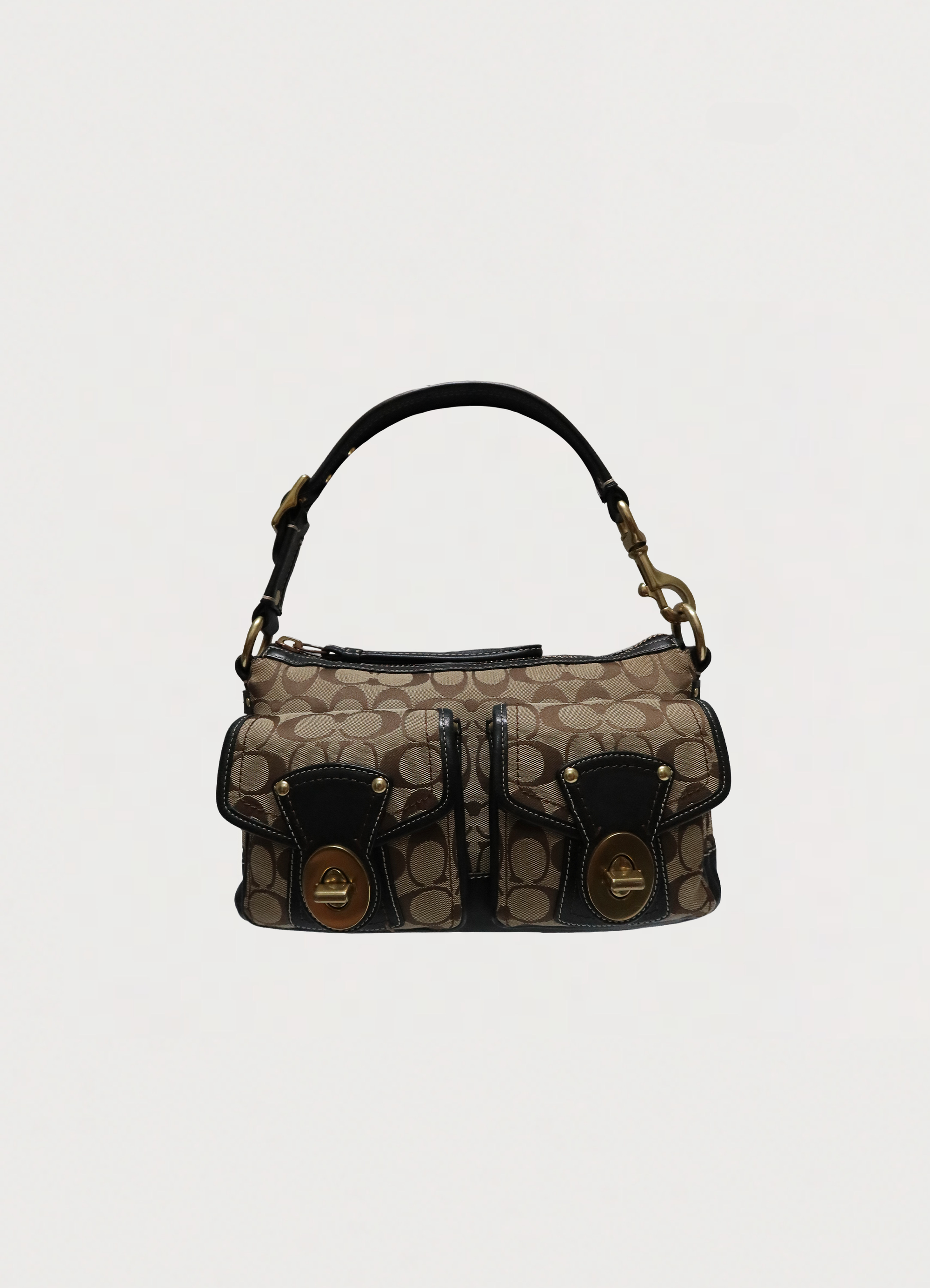 Vintage Coach Legacy Signature turnlock satchel in khaki canvas and ebony leather front view