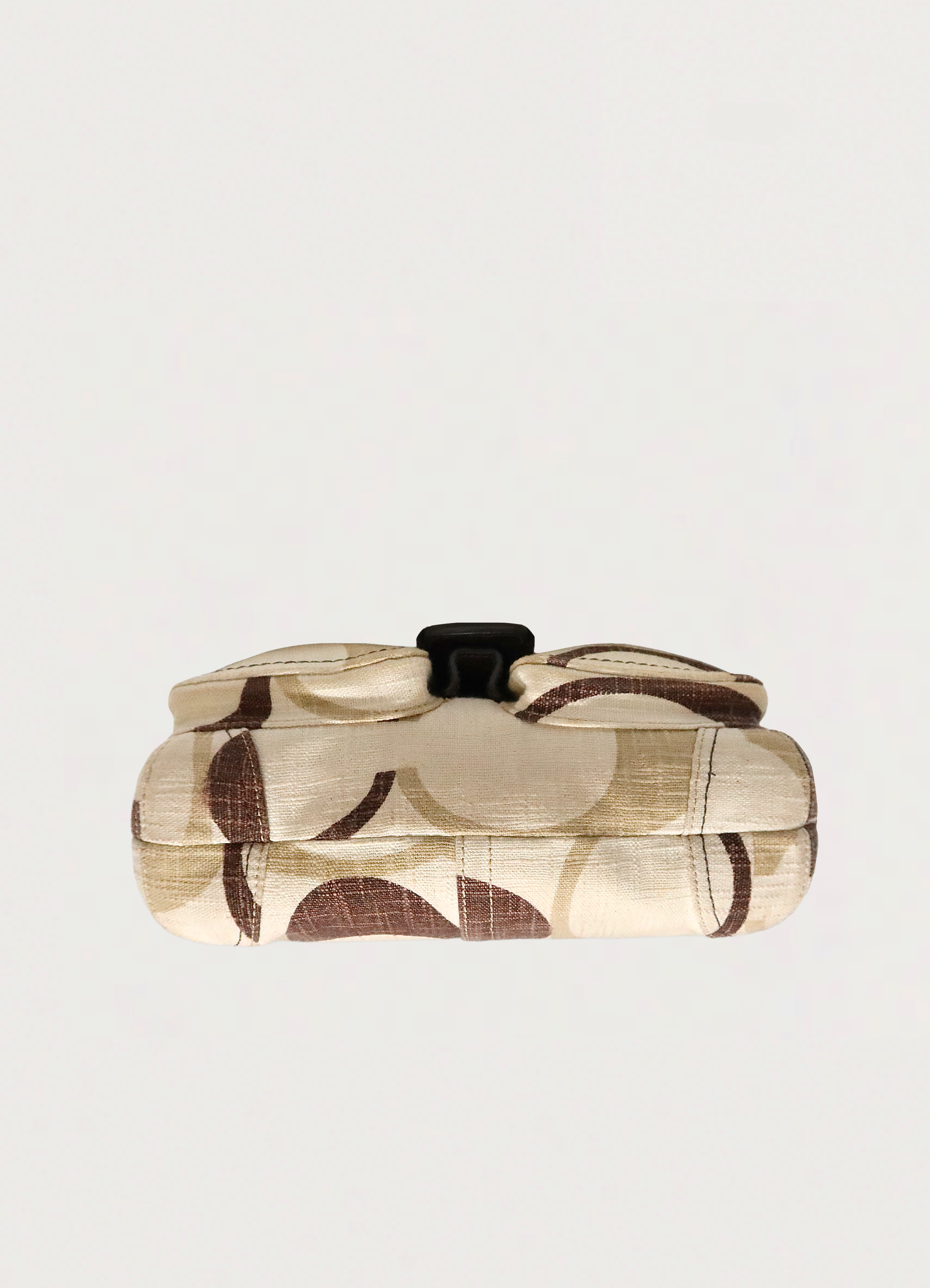 Base view of Coach Optic Signature Soho flap bag showing khaki canvas bottom