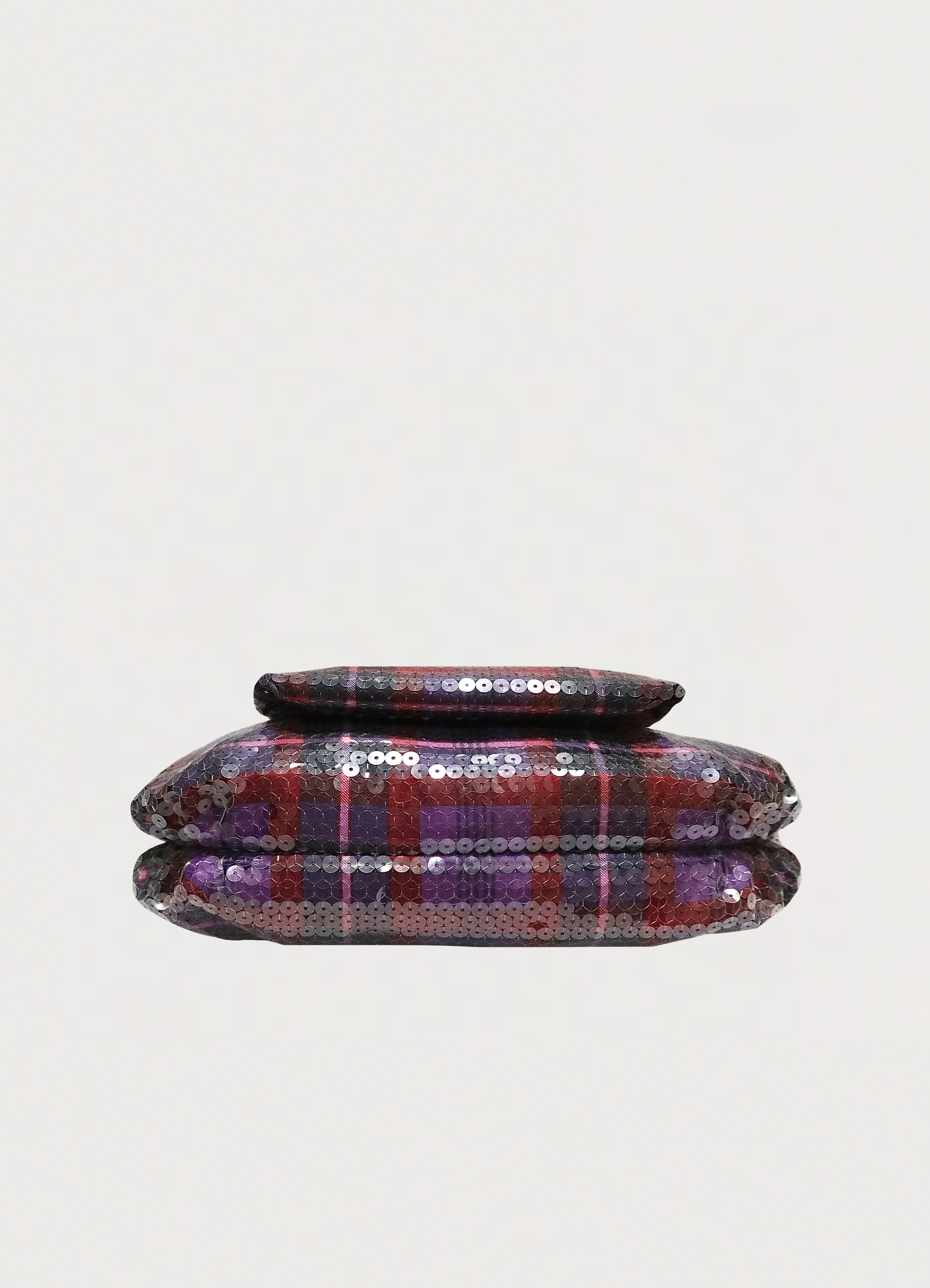 Base view of purple Coach Poppy Groovy bag showing sequin plaid pattern