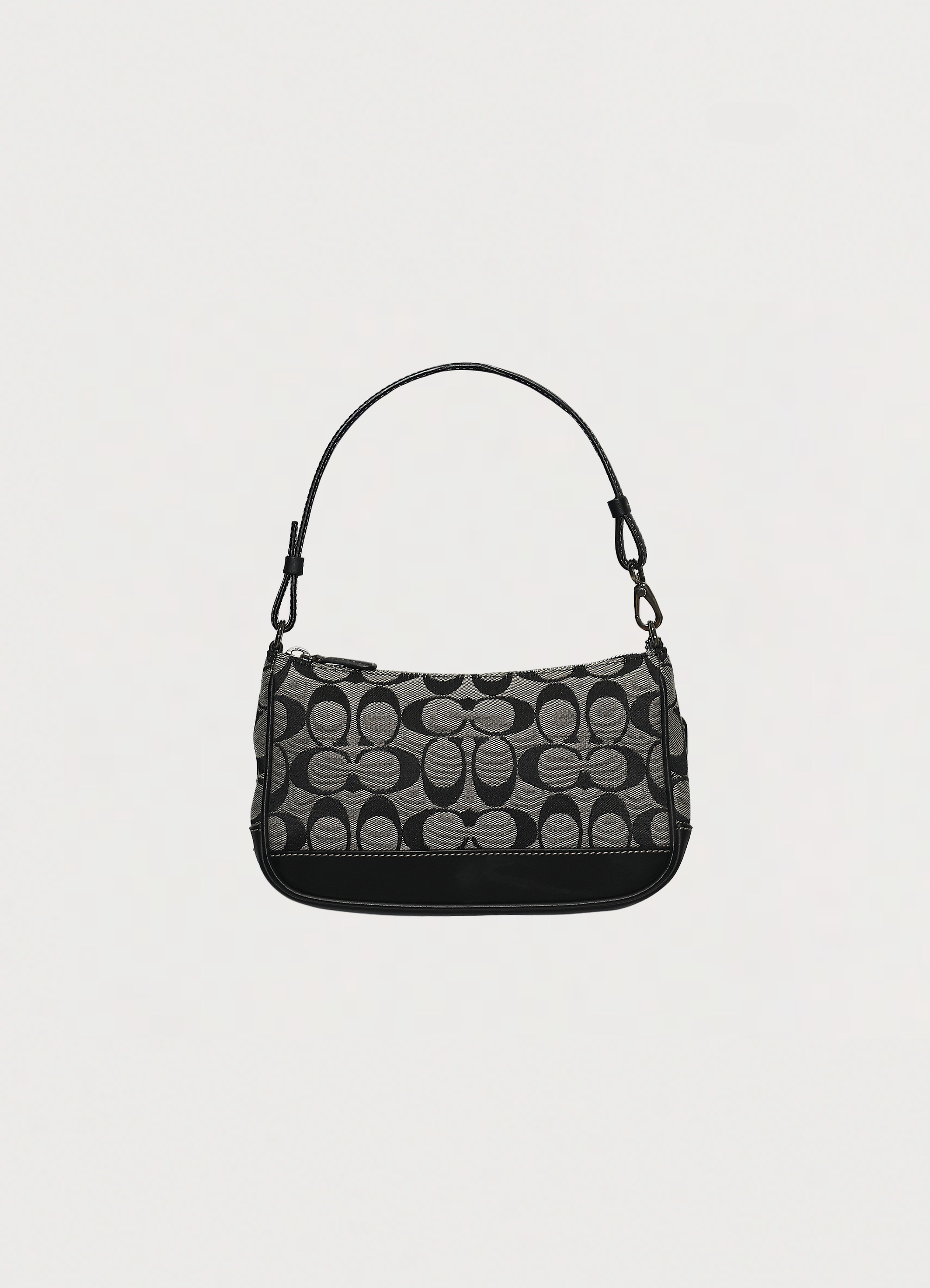 Vintage Coach Signature demi pochette bag in black and grey monogram canvas back view