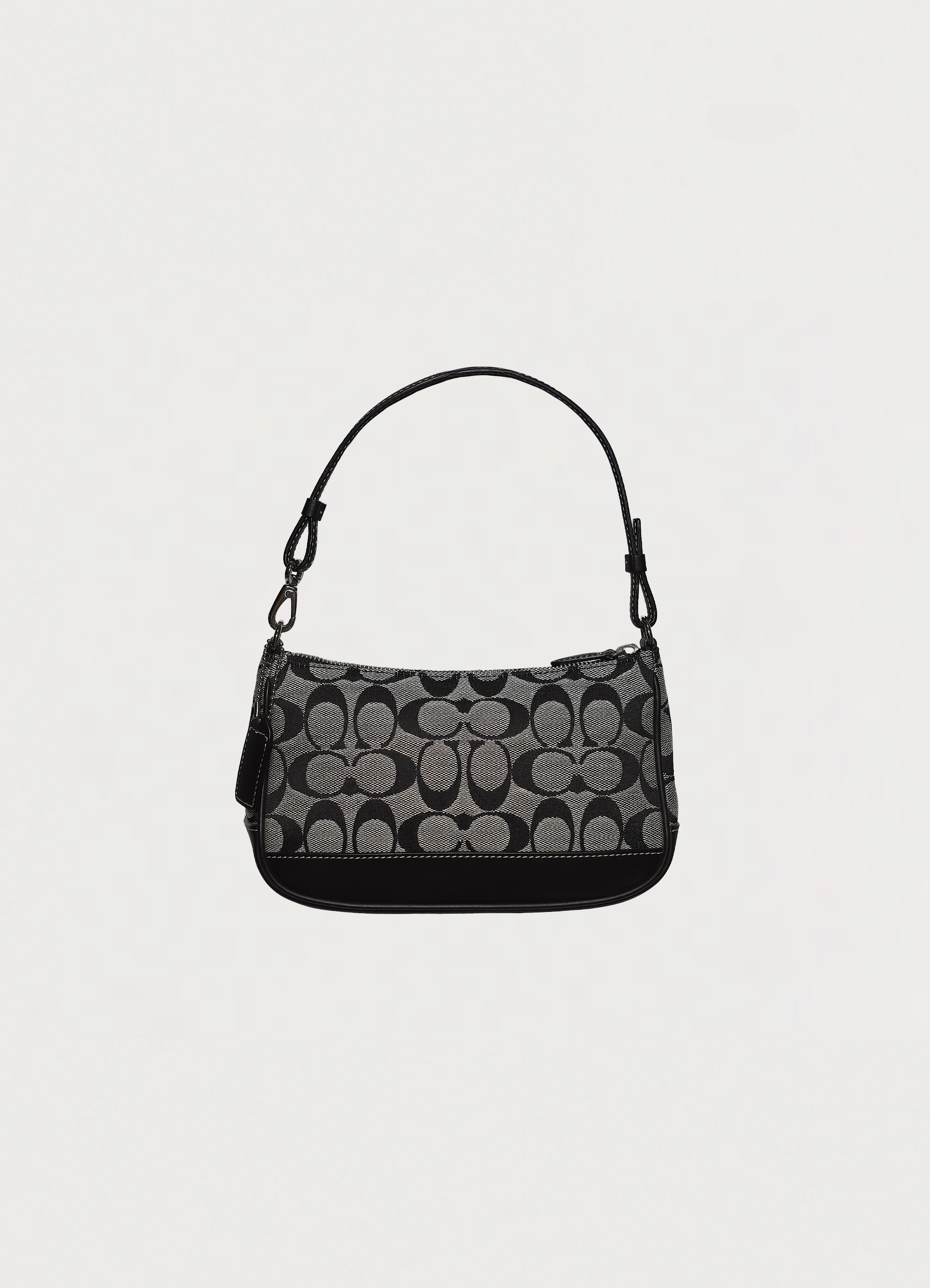 Vintage Coach Signature demi pochette bag in black and grey monogram canvas front view