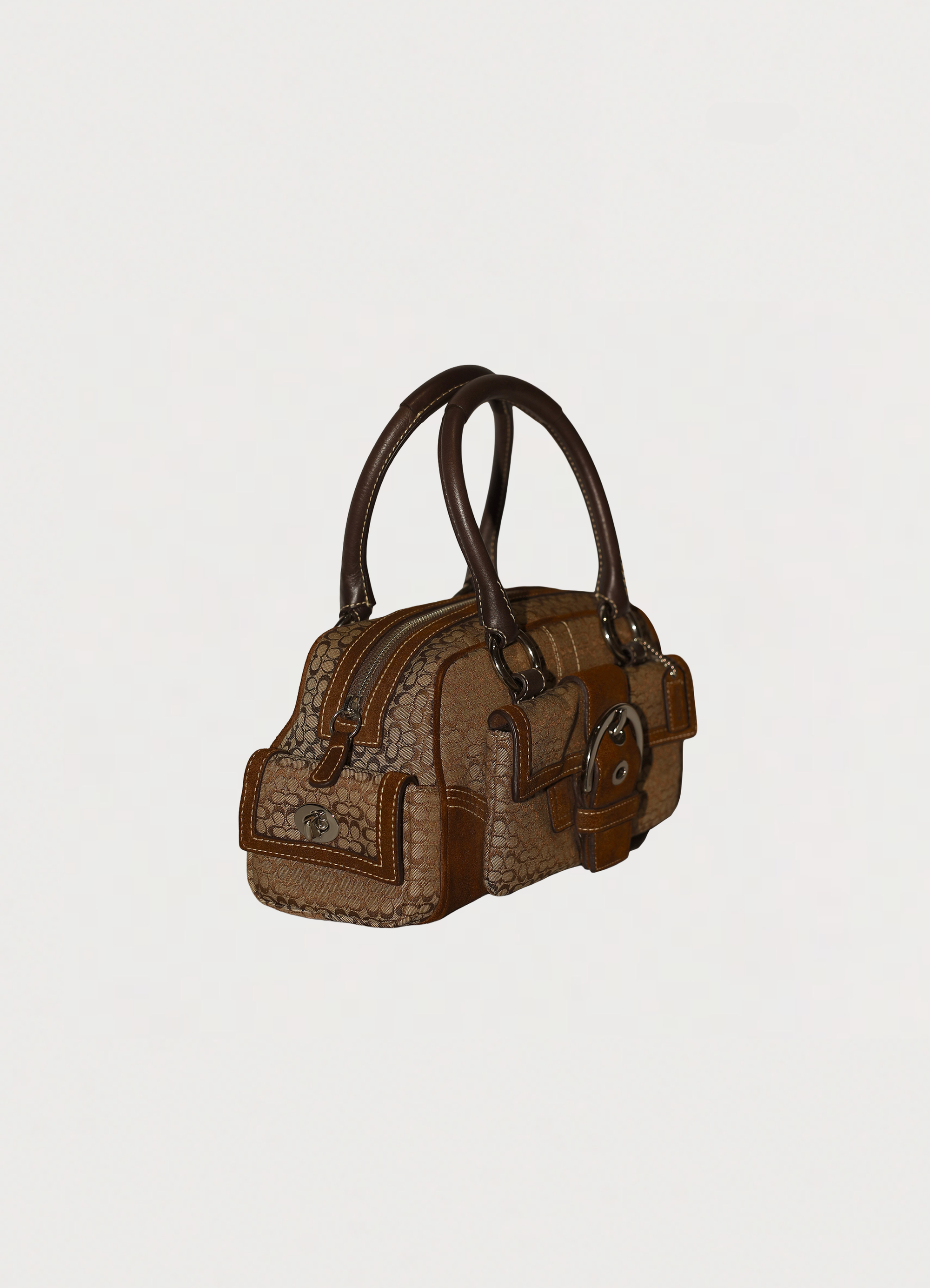 Vintage Coach Soho buckle satchel in brown signature canvas with leather trim angle side