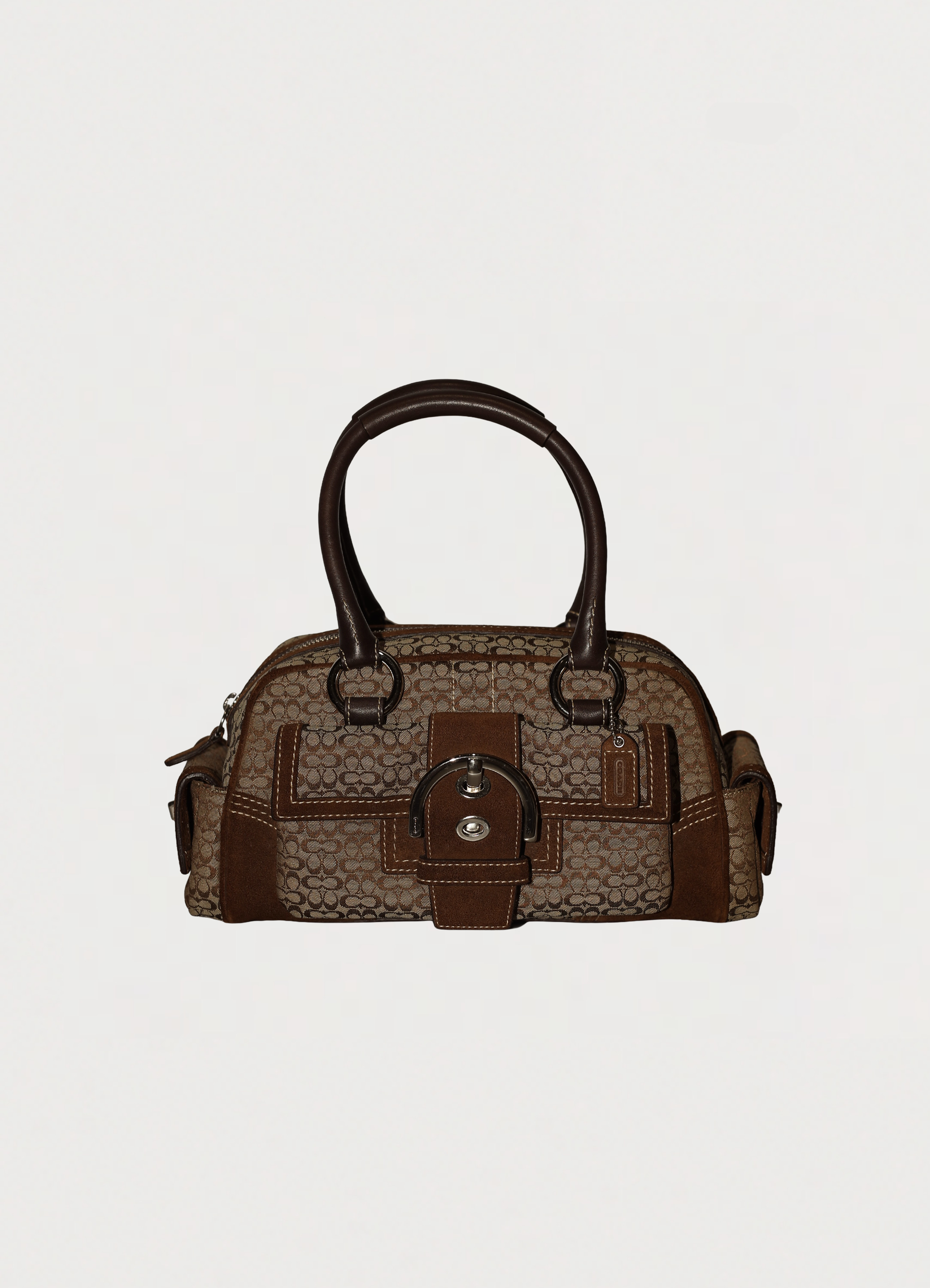 Vintage Coach Soho buckle satchel in brown signature canvas with leather trim view of front