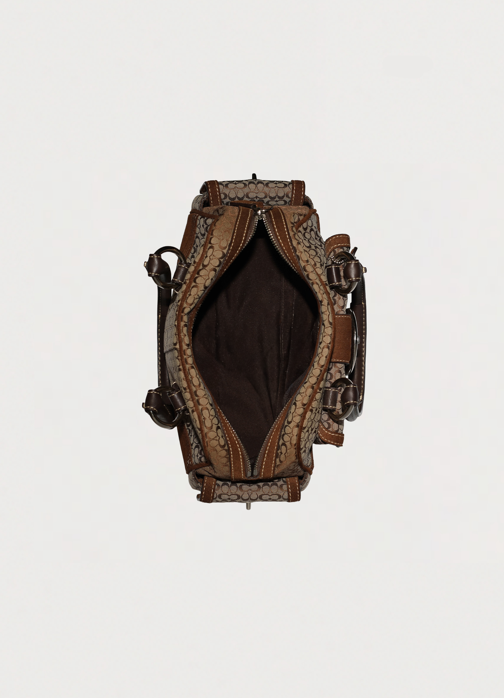 Vintage Coach Soho buckle satchel in brown signature canvas with leather trim top view interior showing