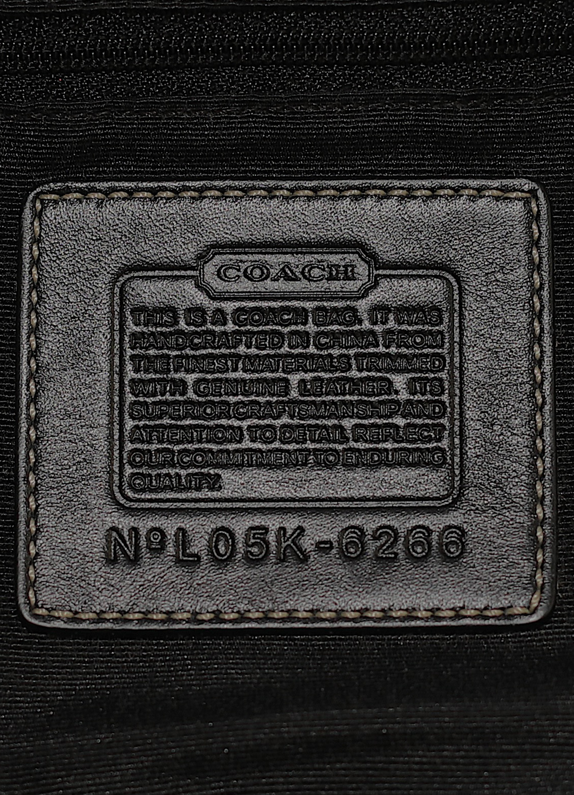 Vintage Coach Soho hobo bag in black signature canvas with leather trim