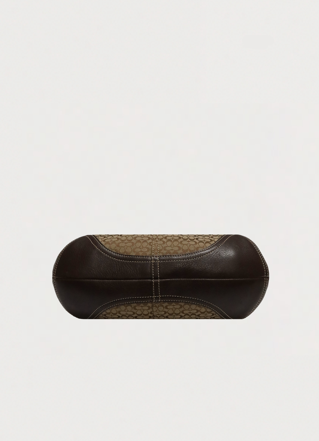 Base view of Coach Soho hobo showing brown leather bottom
