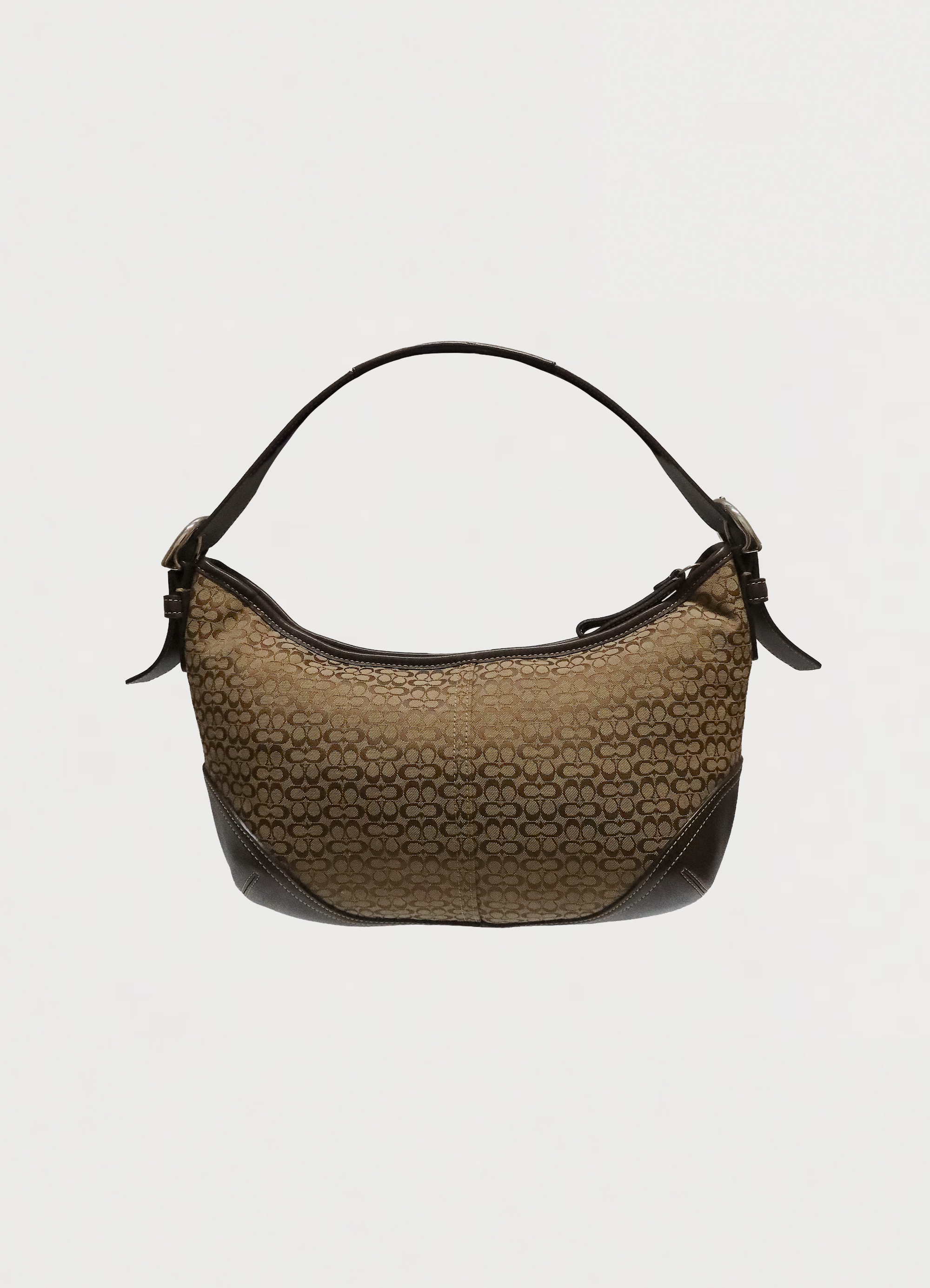 Vintage Coach Soho hobo bag in khaki signature canvas and brown leather front view