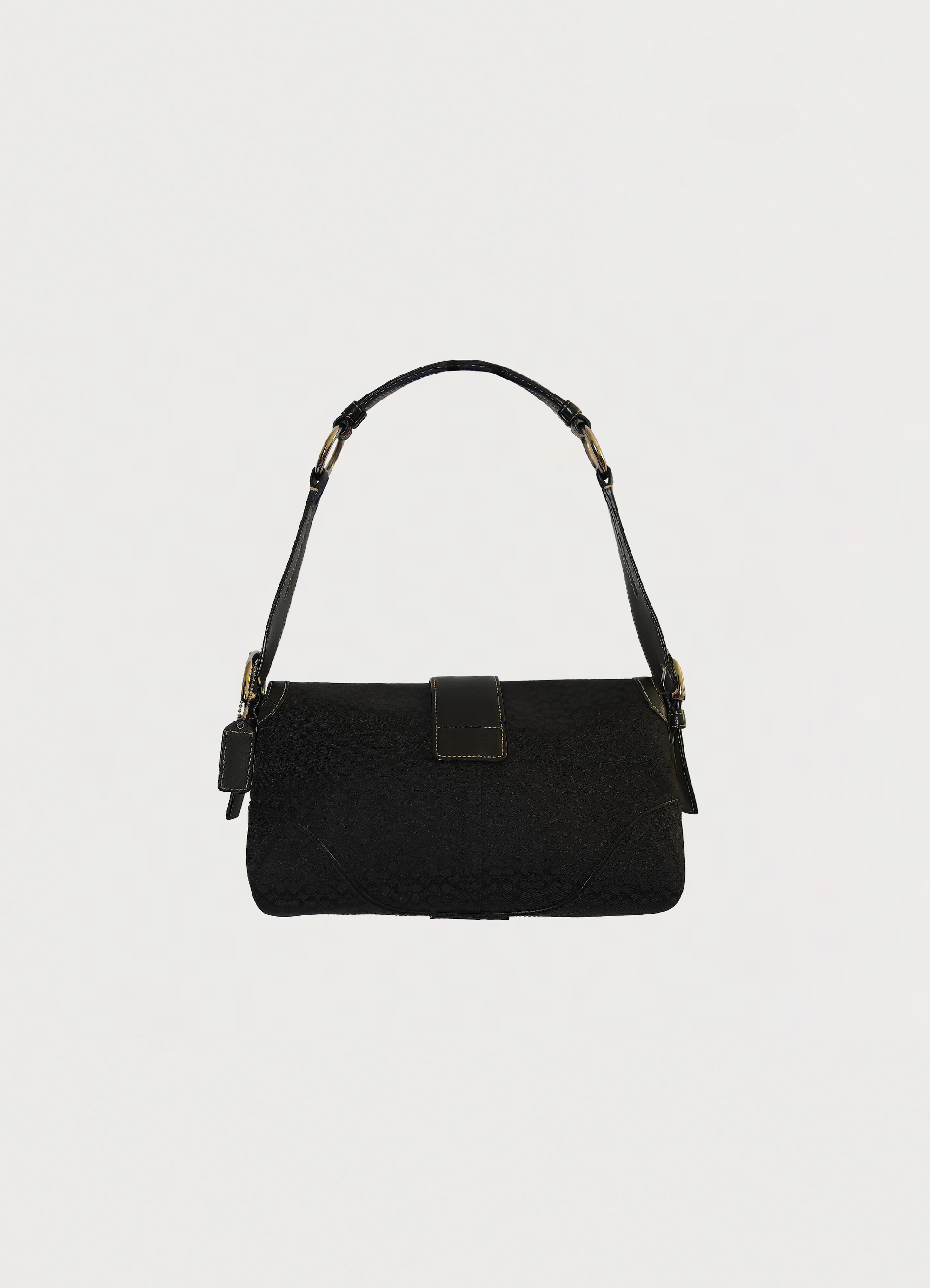 Vintage Coach Soho flap shoulder bag in black signature canvas back view