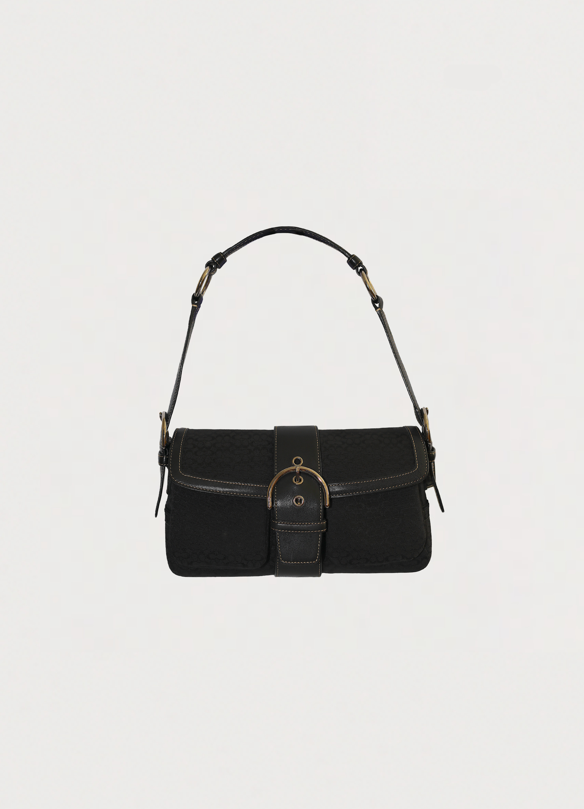 Vintage Coach Soho flap shoulder bag in black signature canvas front view