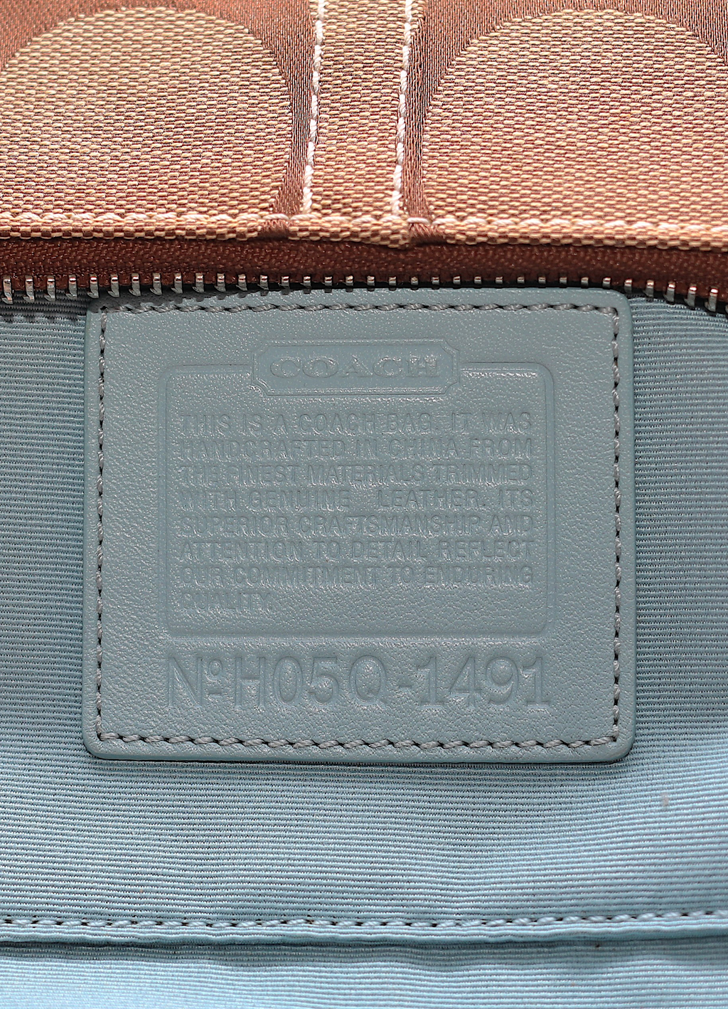 Vintage Coach Tropical Fish Demi bag in brown signature canvas with leather trim showing creed patch