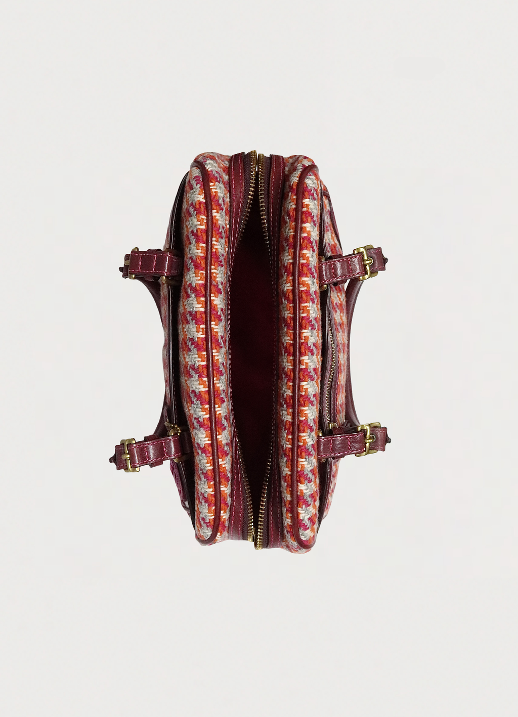 Top view of Coach Hadley satchel showing pink fabric interior and zipper opening