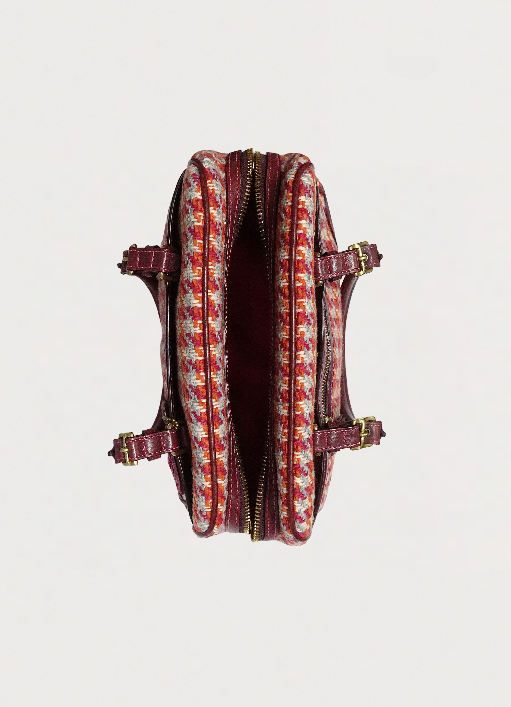 Top view of Coach Hadley satchel showing pink fabric interior and zipper opening