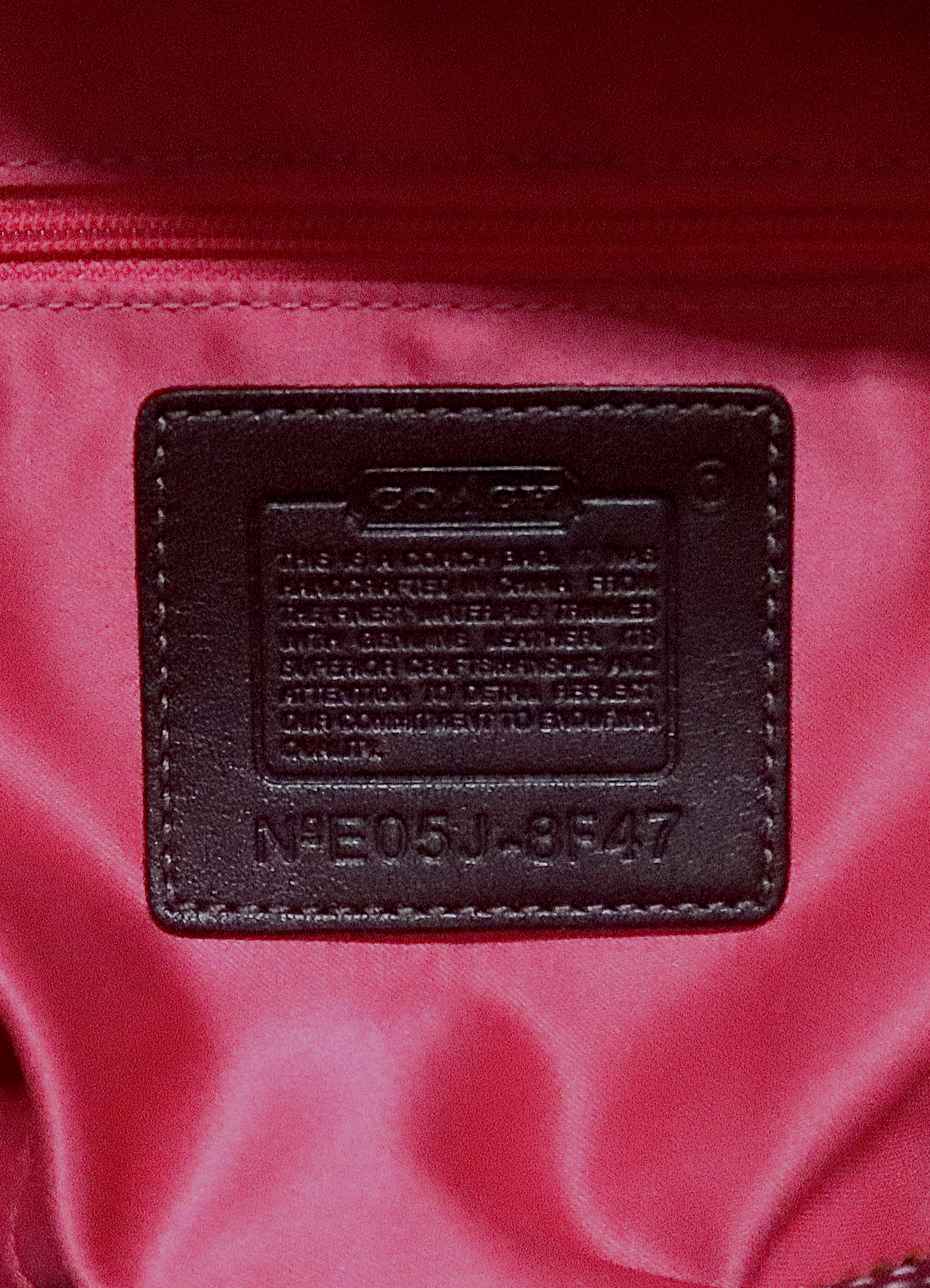 Interior leather Coach creed patch with style number for authenticity