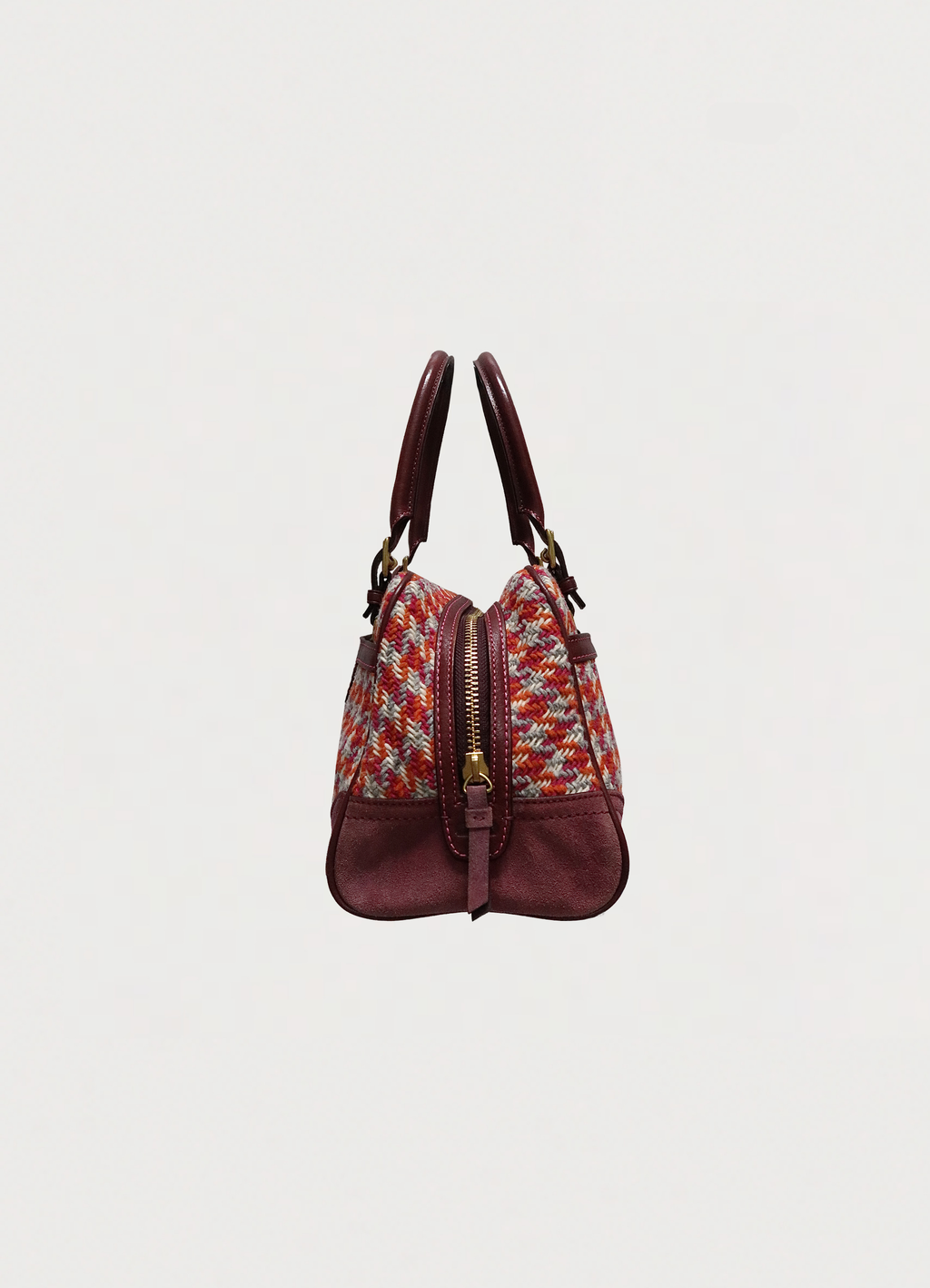 Left side profile of Coach Hadley satchel in houndstooth tweed and suede