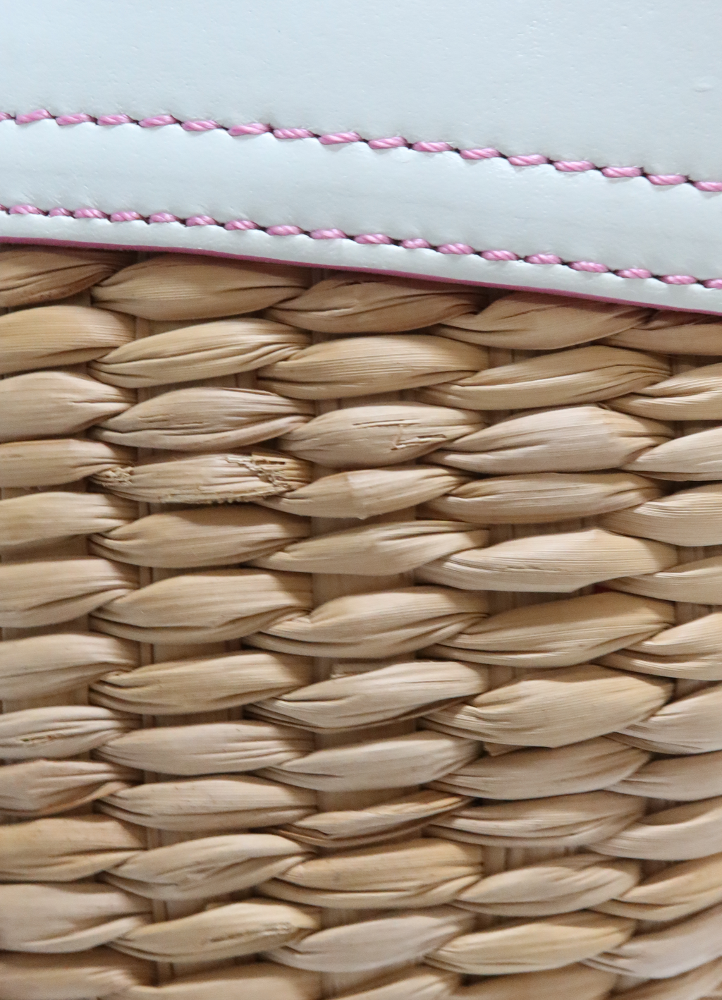 Close up of authentic tightly woven natural straw wicker texture