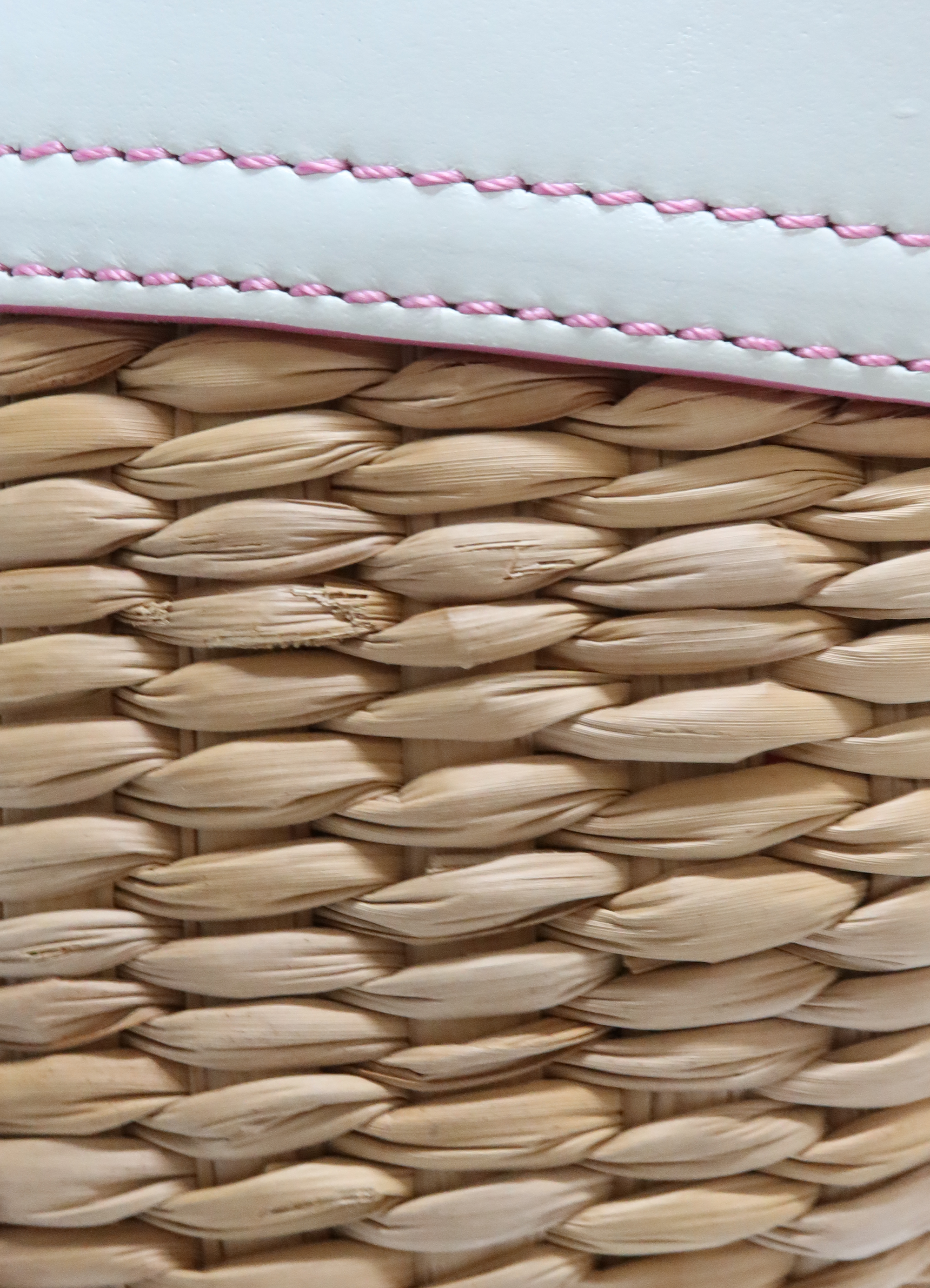 Close up of authentic tightly woven natural straw wicker texture